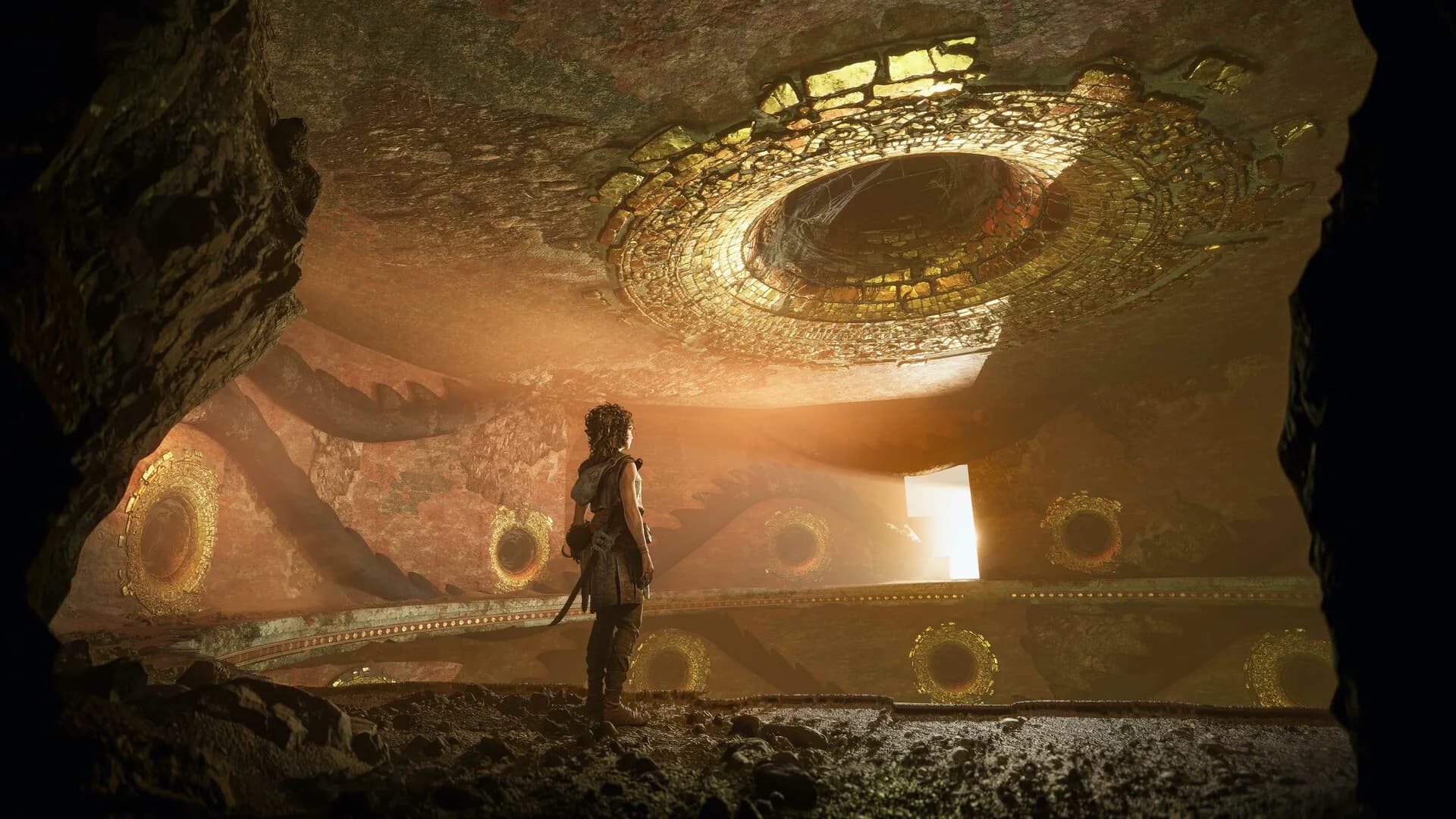 Sophia explores a huge illuminated chamber in an official screenshot